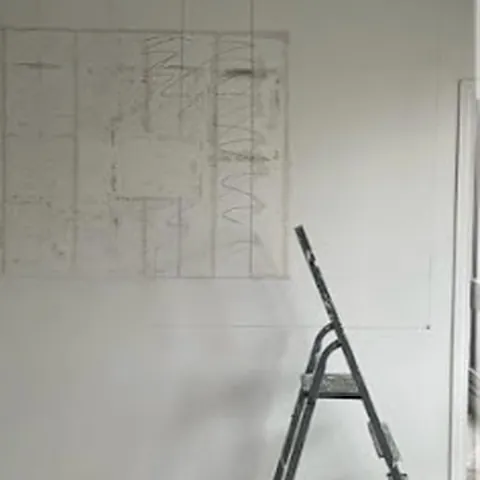 Avant : mur plein en cours de préparation